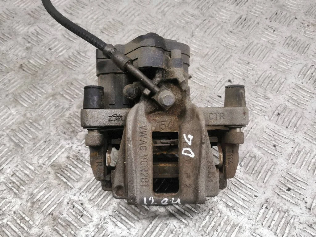 Rear brake caliper – right
