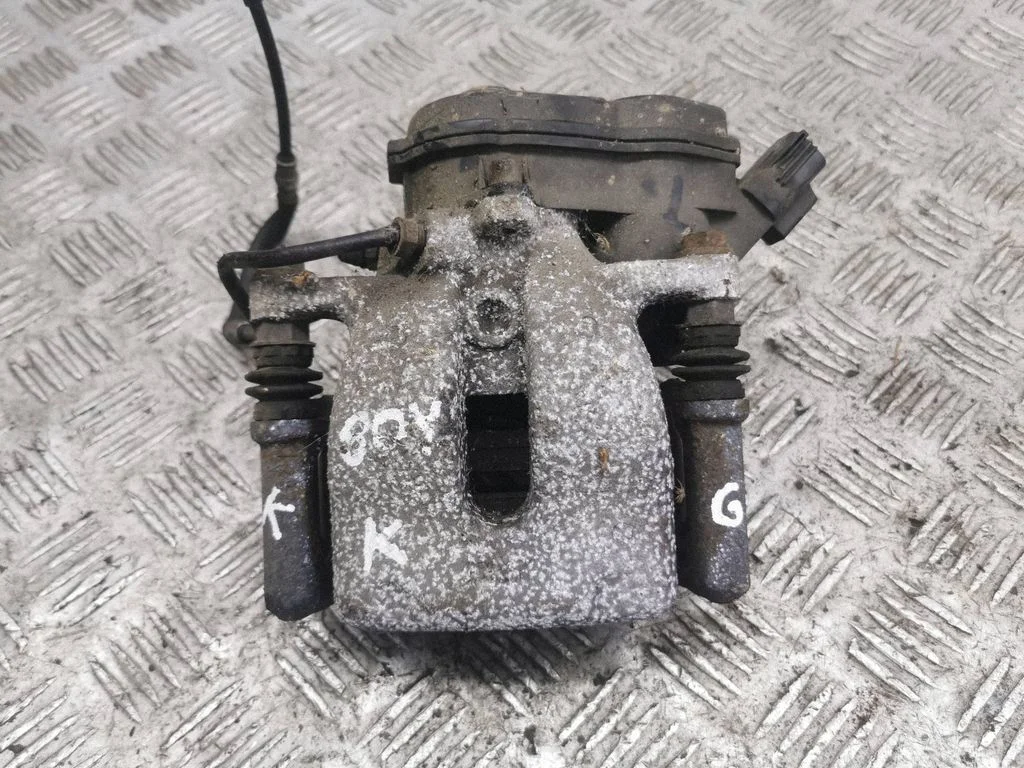 Rear brake caliper – left