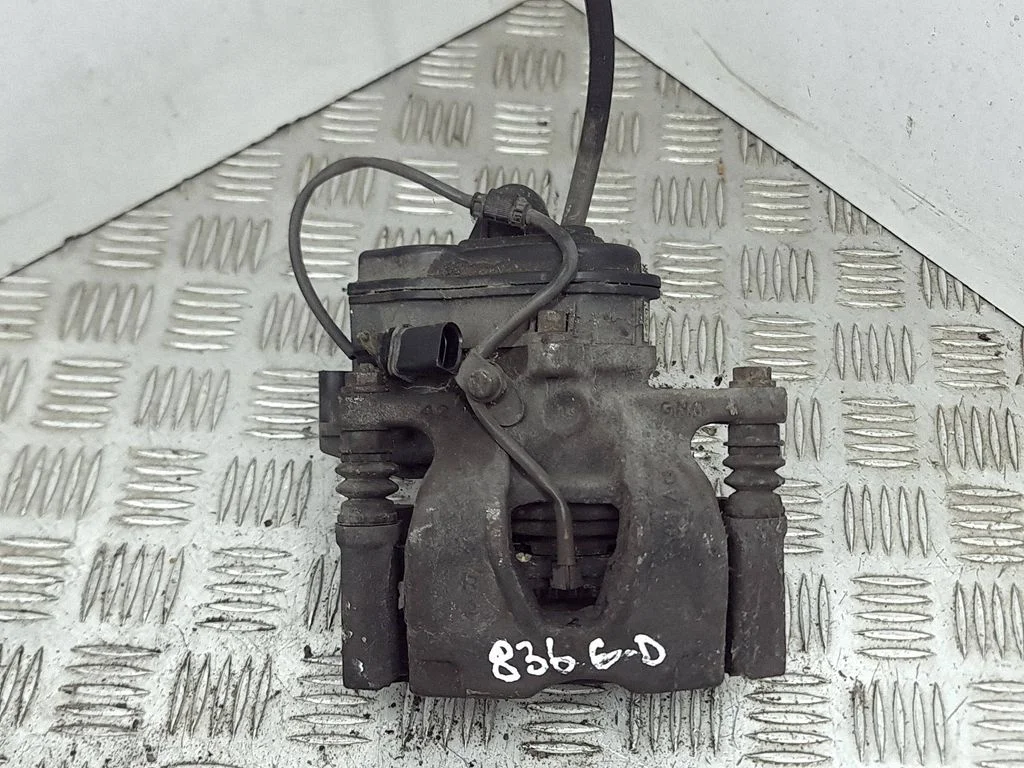 Rear brake caliper – right