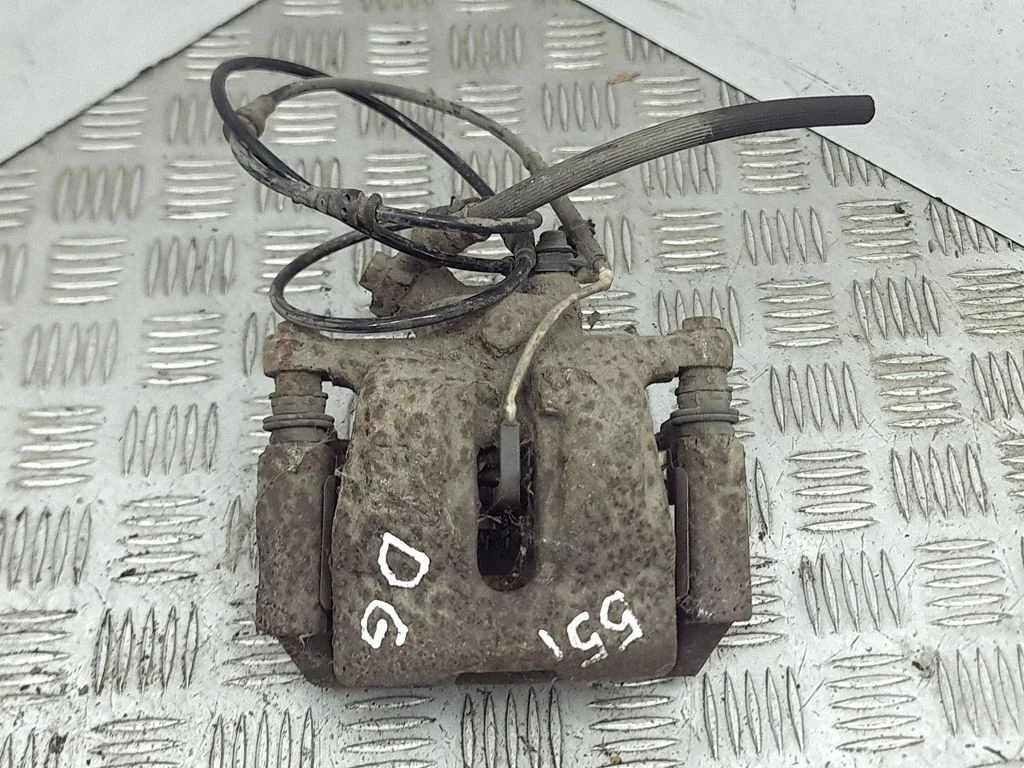 Rear brake caliper – right
