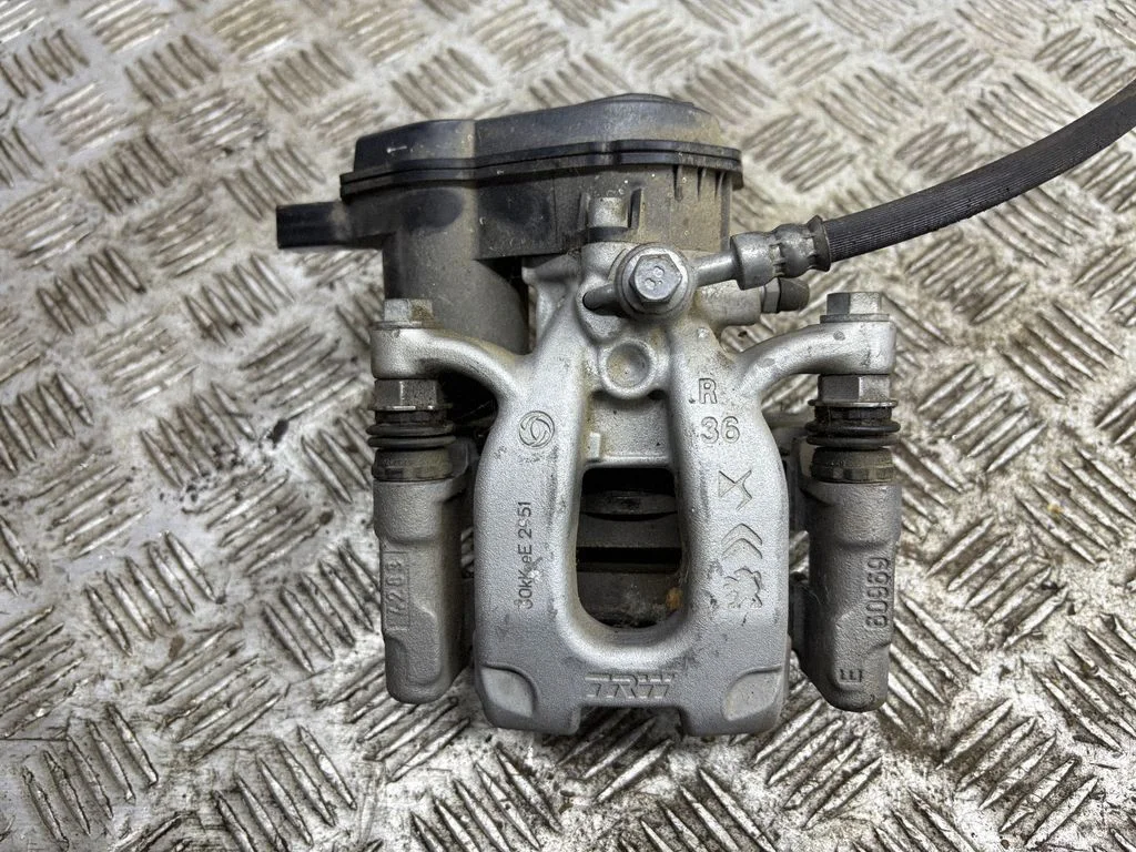 Rear brake caliper – right