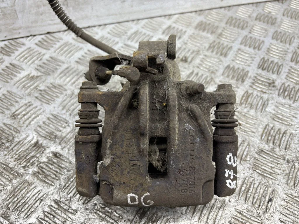 Rear brake caliper – right