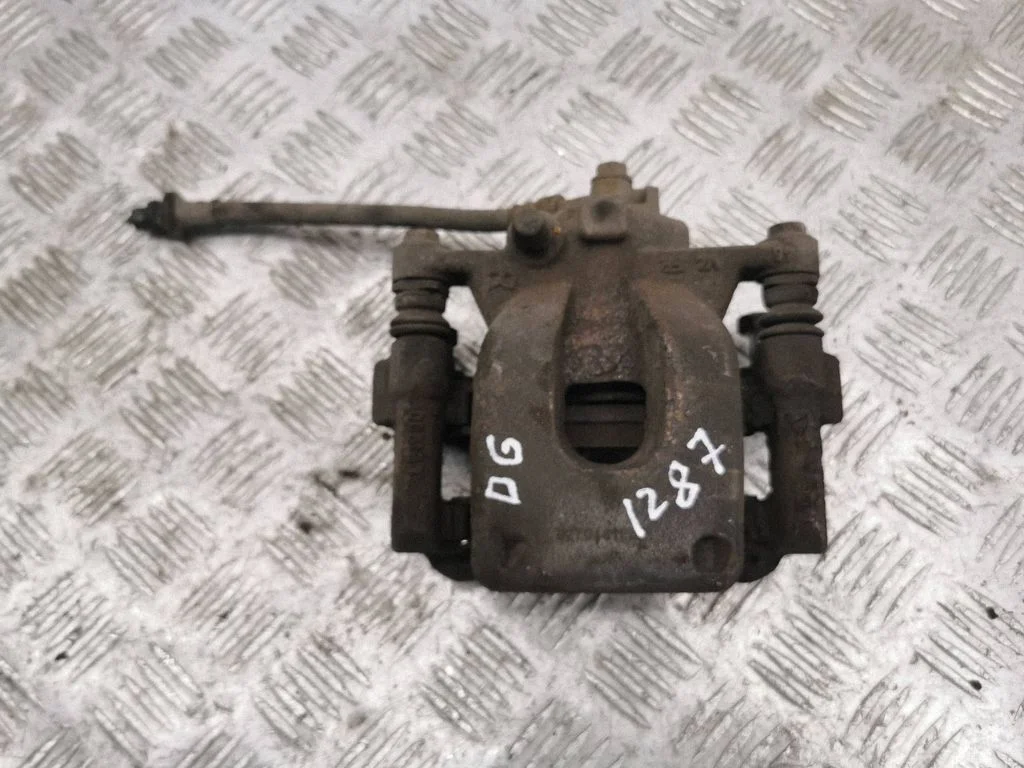 Rear brake caliper – right