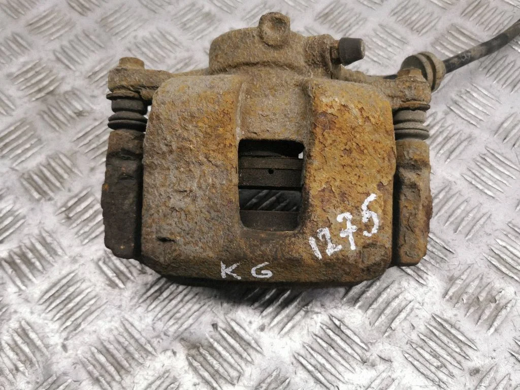 Rear brake caliper – left