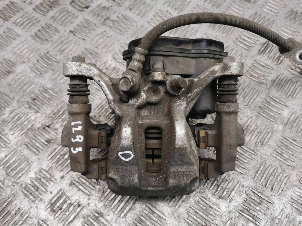 Rear brake caliper – right