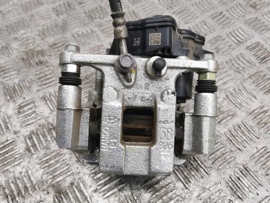 Rear brake caliper – right
