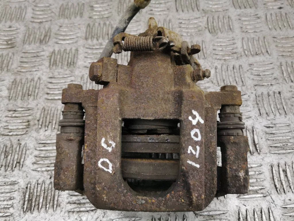 Rear brake caliper – right