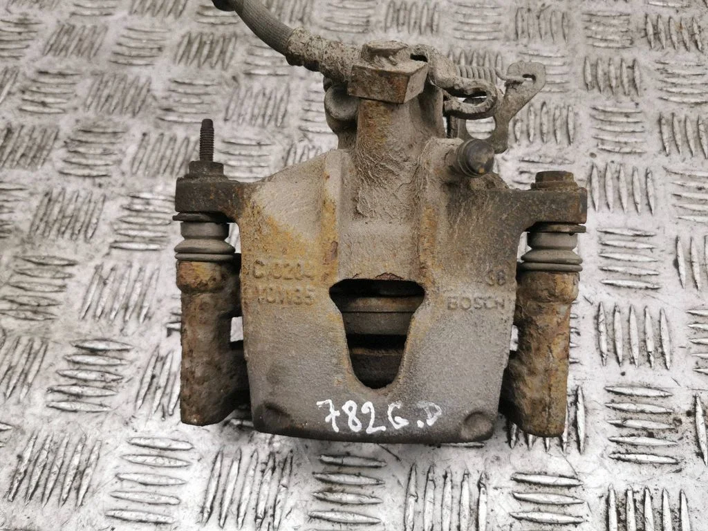 Rear brake caliper – right