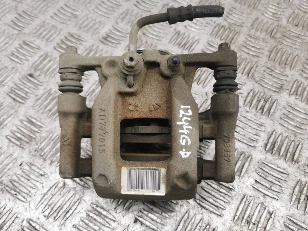Rear brake caliper – right