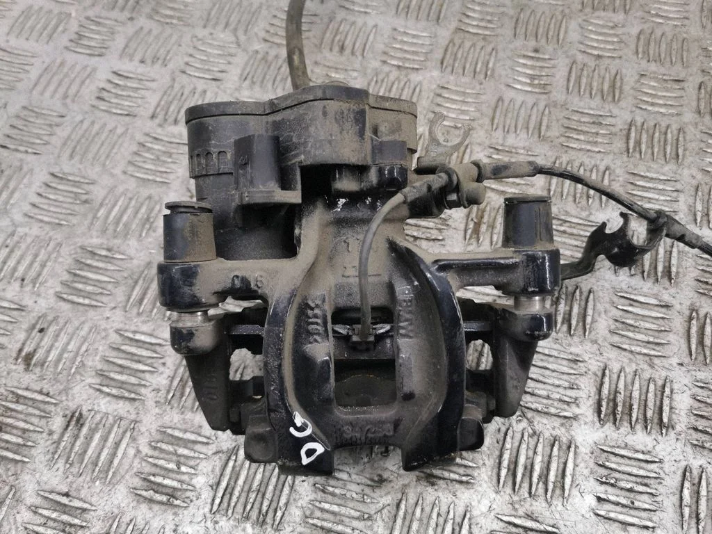 Rear brake caliper – right