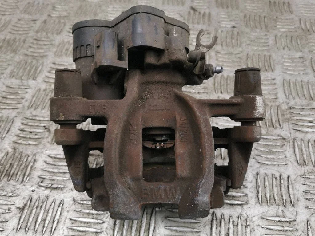 Rear brake caliper – right