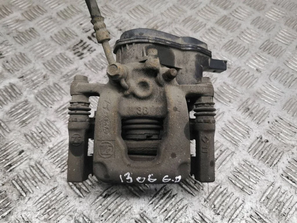 Rear brake caliper – right