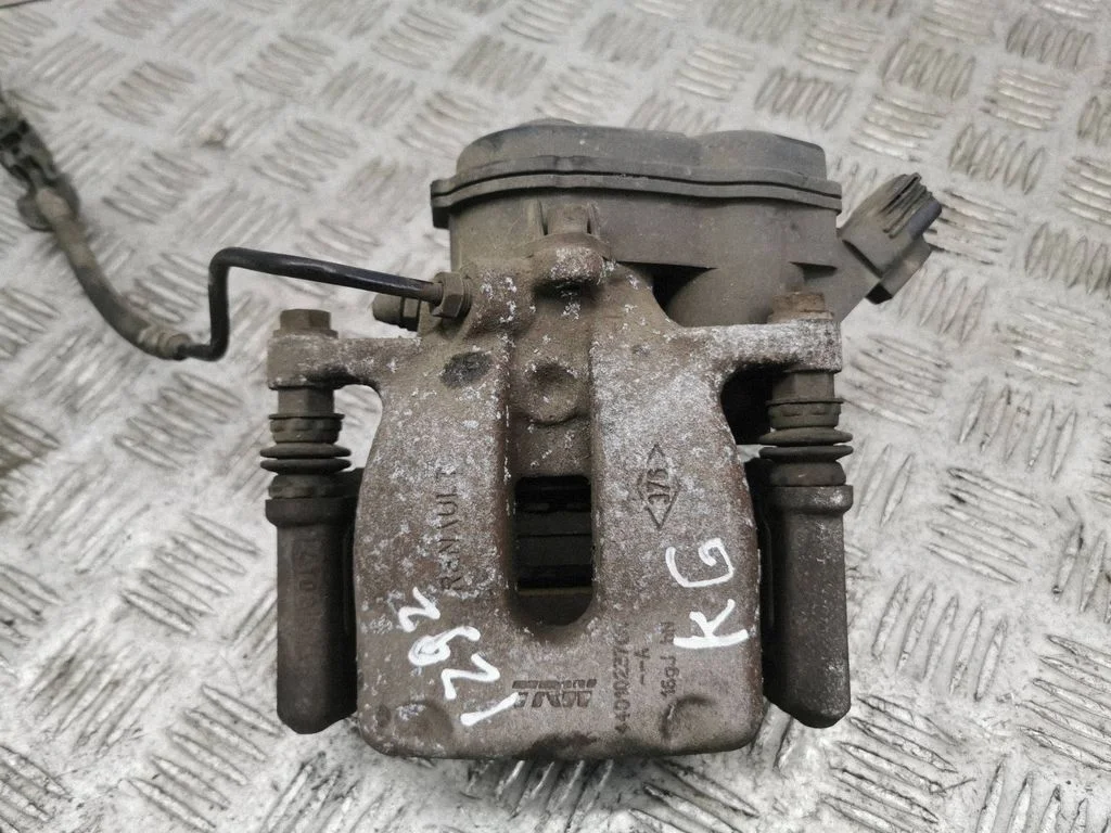 Rear brake caliper – left