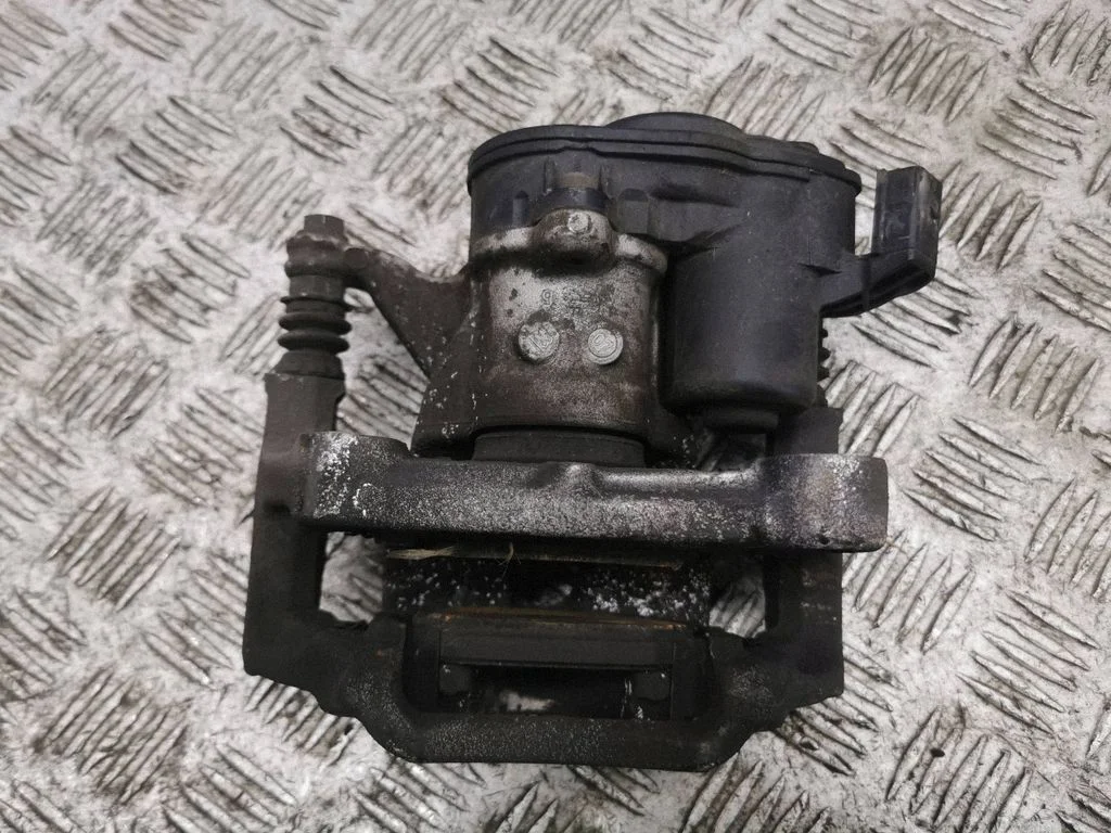 Rear brake caliper – left