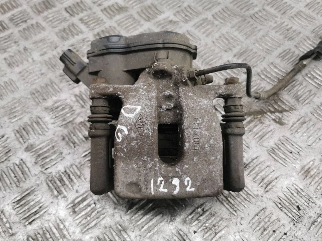 Rear brake caliper – right