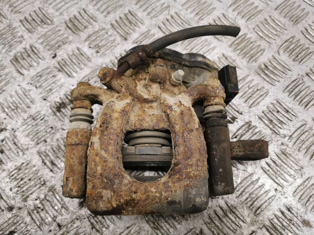 Rear brake caliper – right