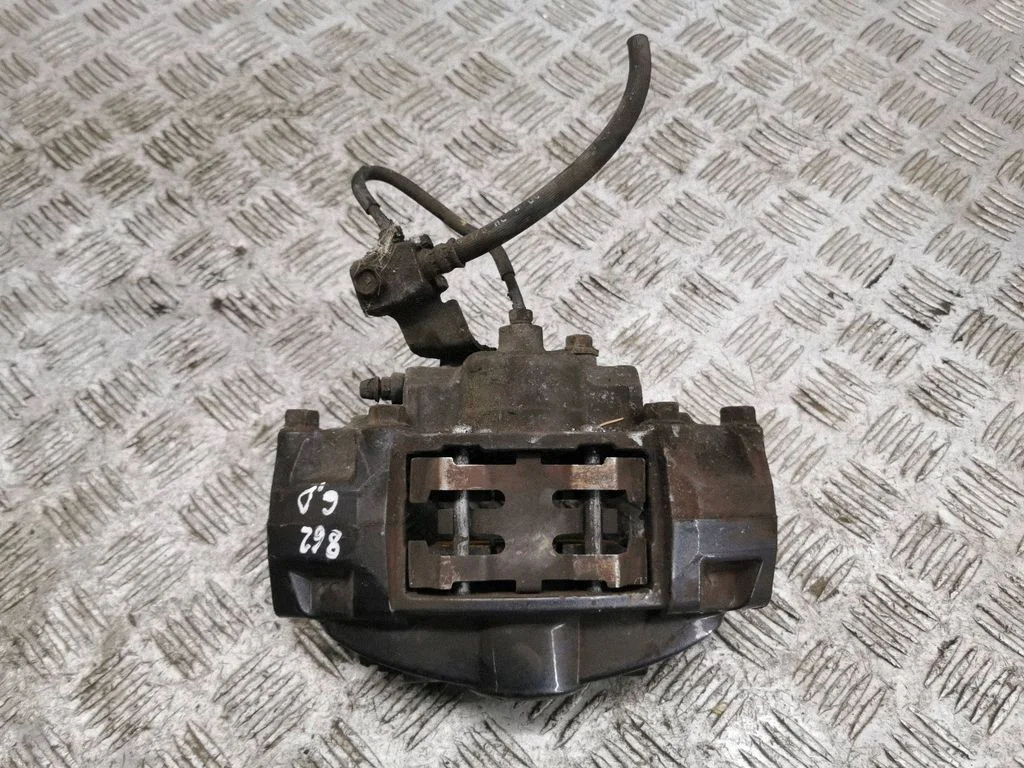 Rear brake caliper – right