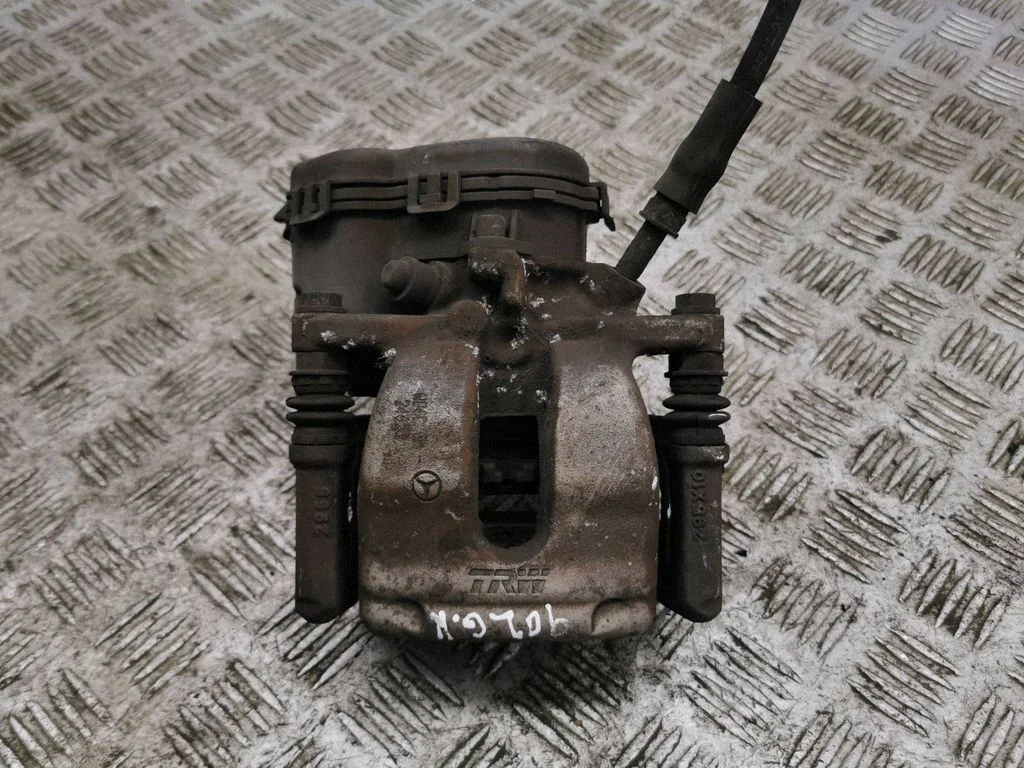 Rear brake caliper – left