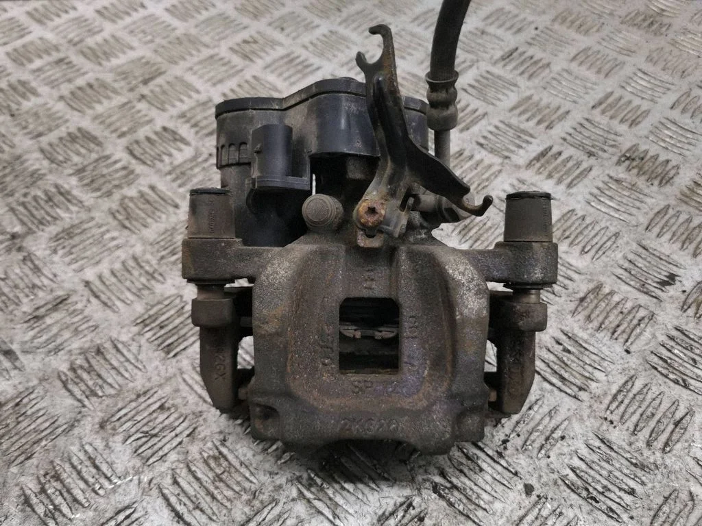 Rear brake caliper K8D22K328AB