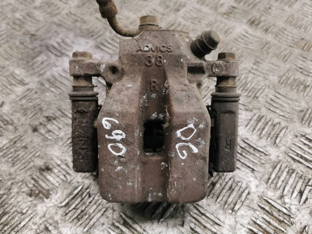 Rear brake caliper – right