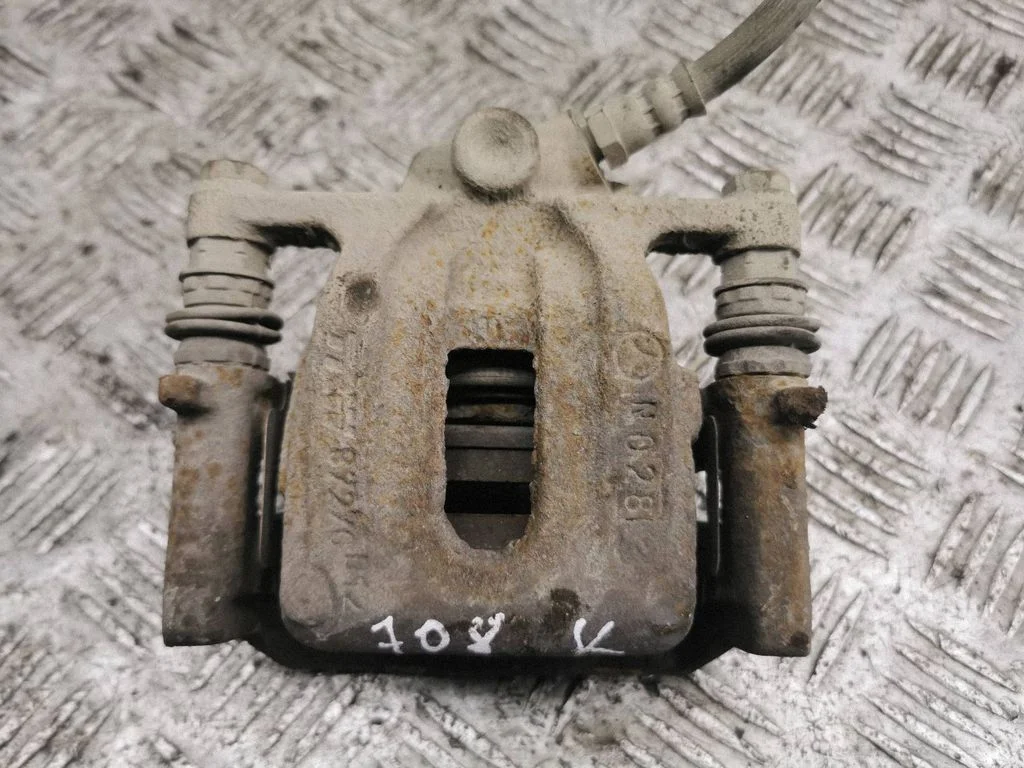 Tagumine pidurisadul – vasak