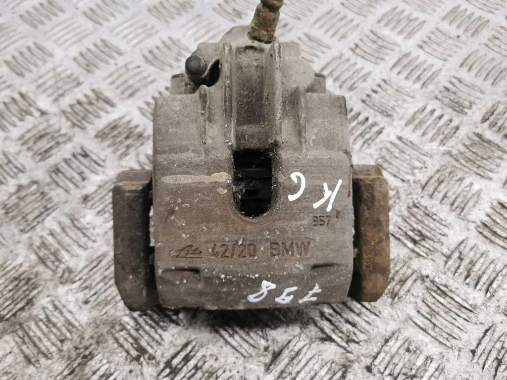 Rear brake caliper – left