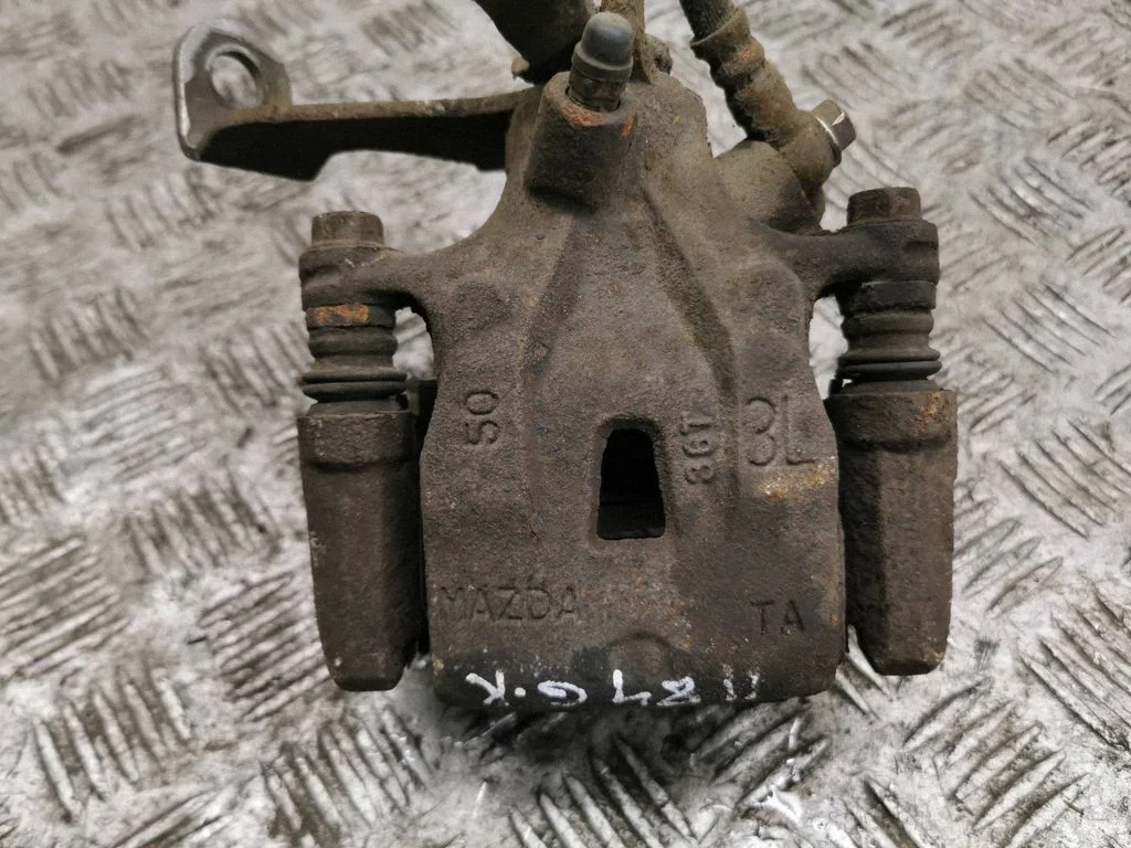 Tagumine pidurisadul – vasak