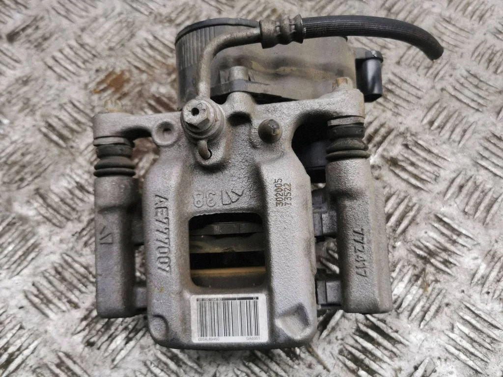 Rear brake caliper – right