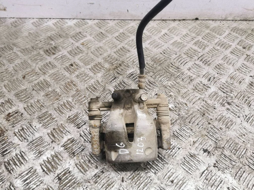 Rear brake caliper – right