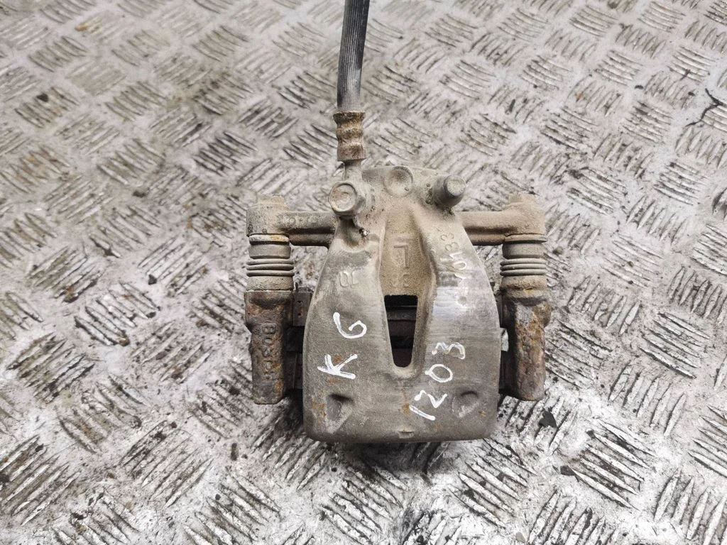 Rear brake caliper – left
