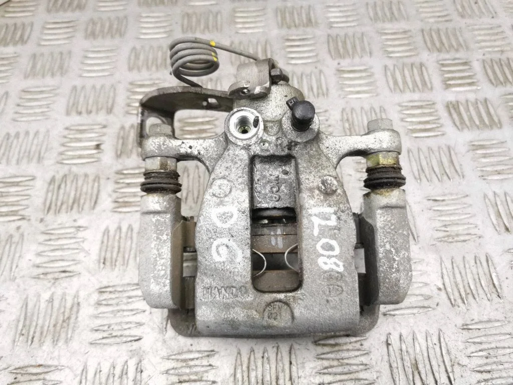 Rear brake caliper – right