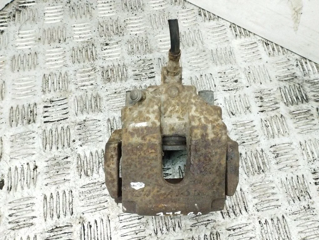 Rear brake caliper – right
