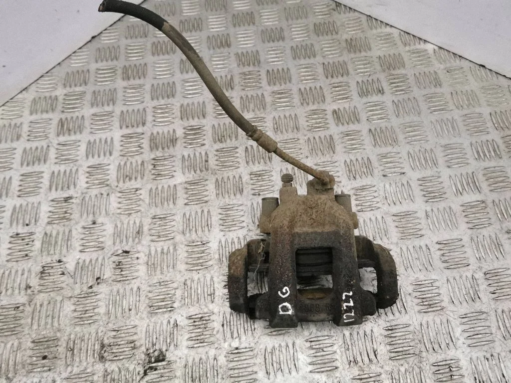 Rear brake caliper – right