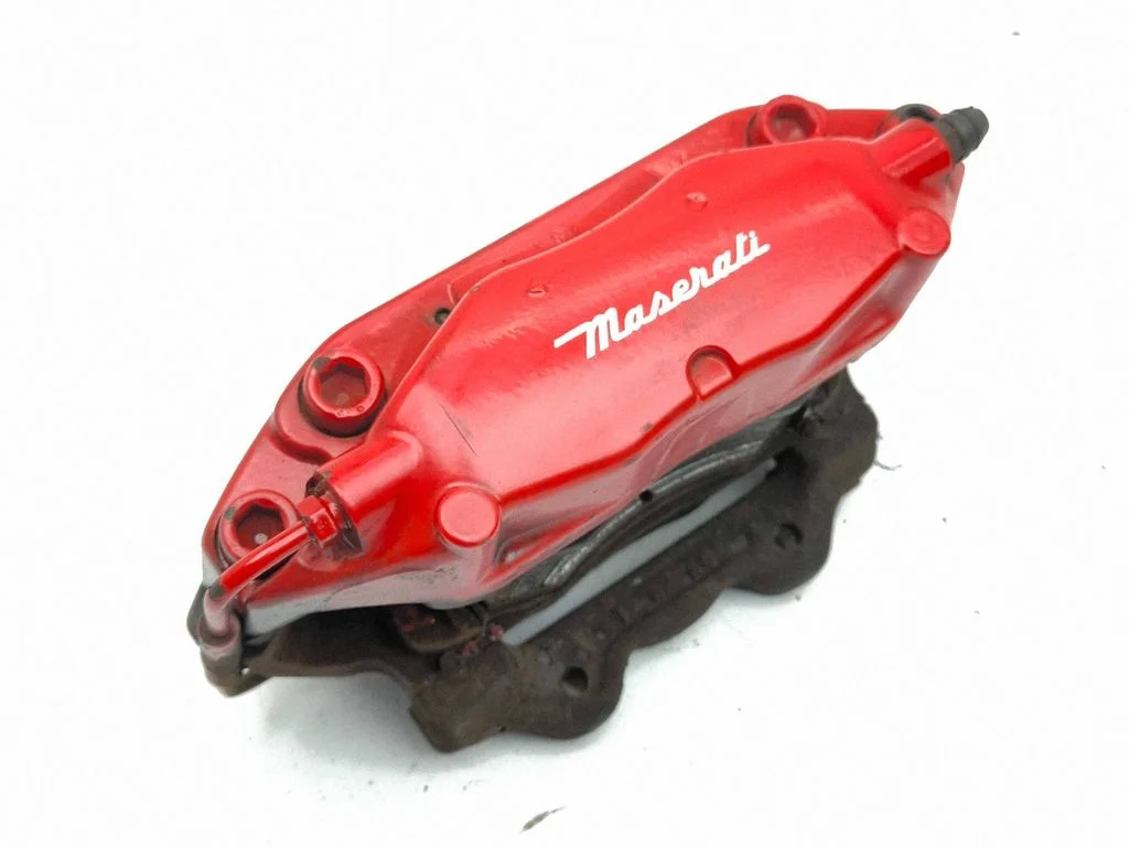 Rear brake caliper – left