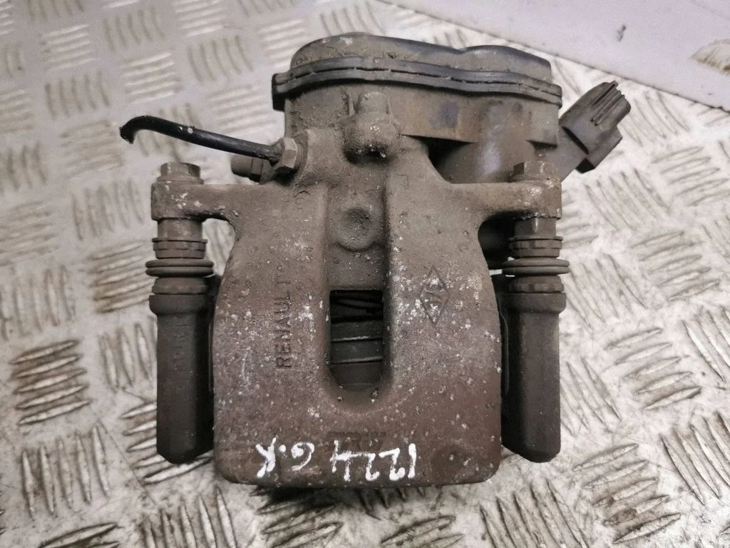 Rear brake caliper – left