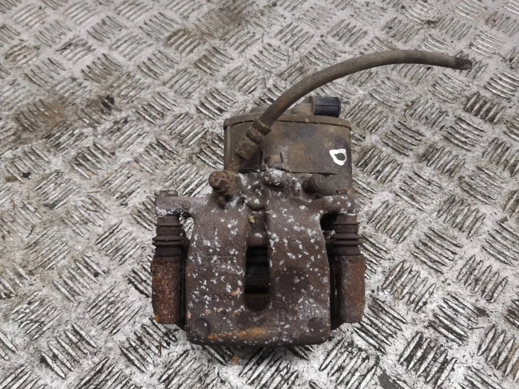 Rear brake caliper – right