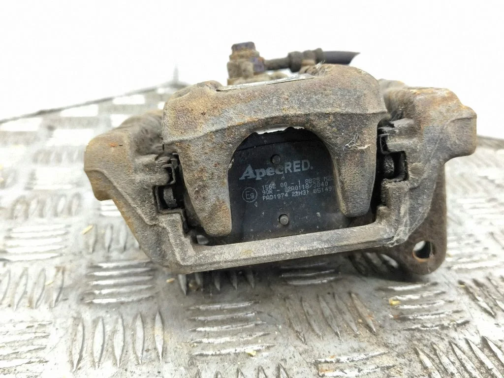 Rear brake caliper – right