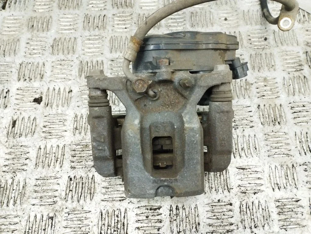 Rear brake caliper – right