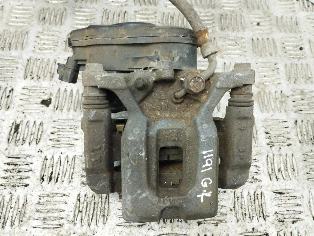 Rear brake caliper – left