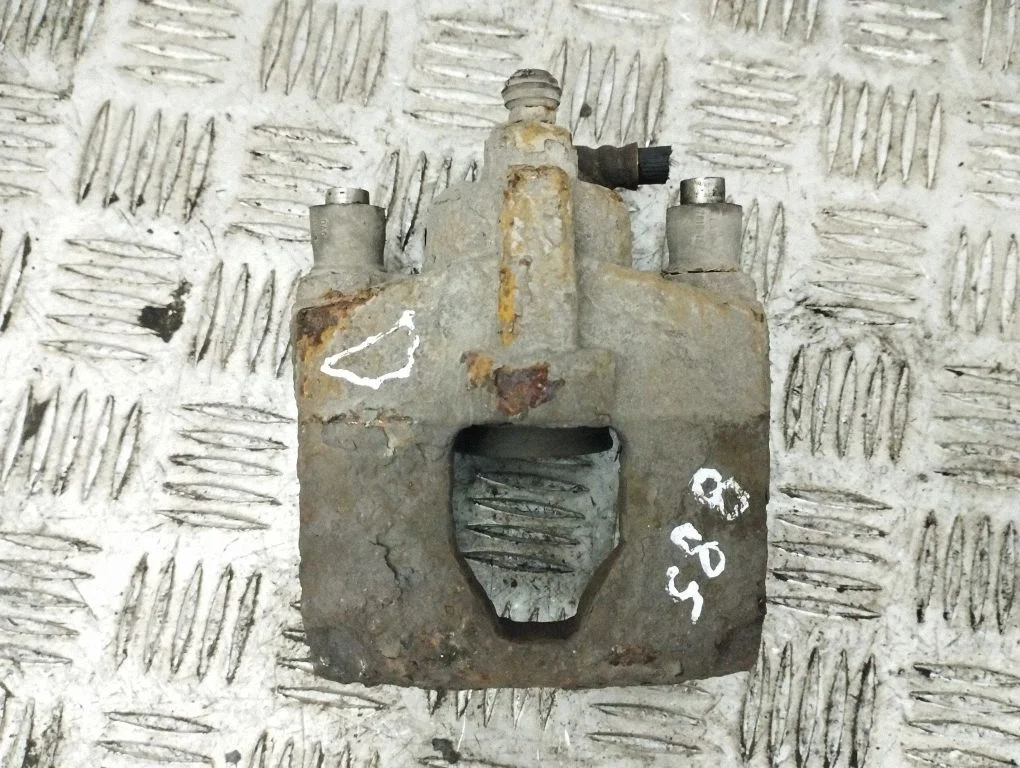 Rear brake caliper – right