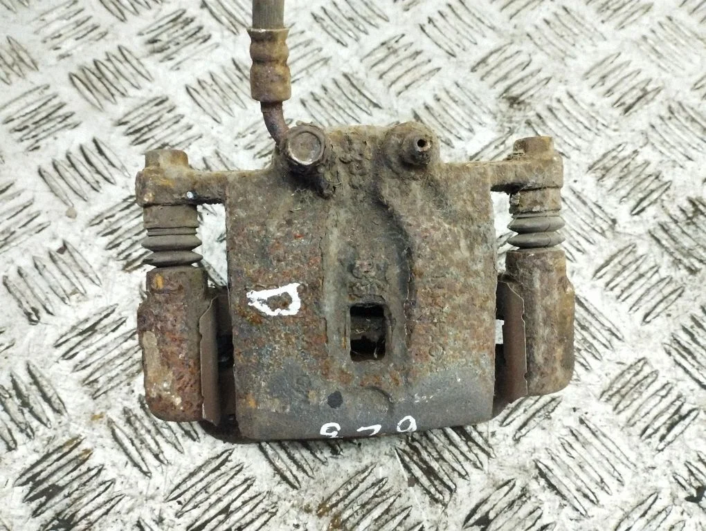 Rear brake caliper – right