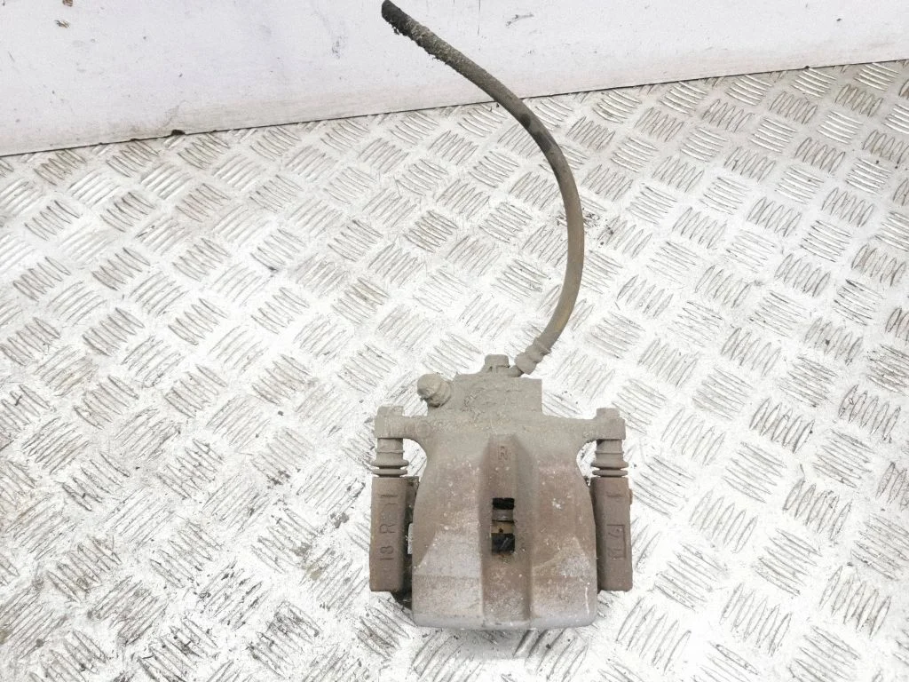 Rear brake caliper – right