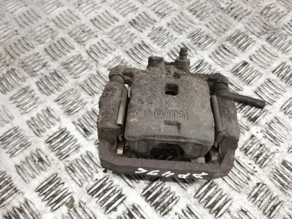 Rear brake caliper – right