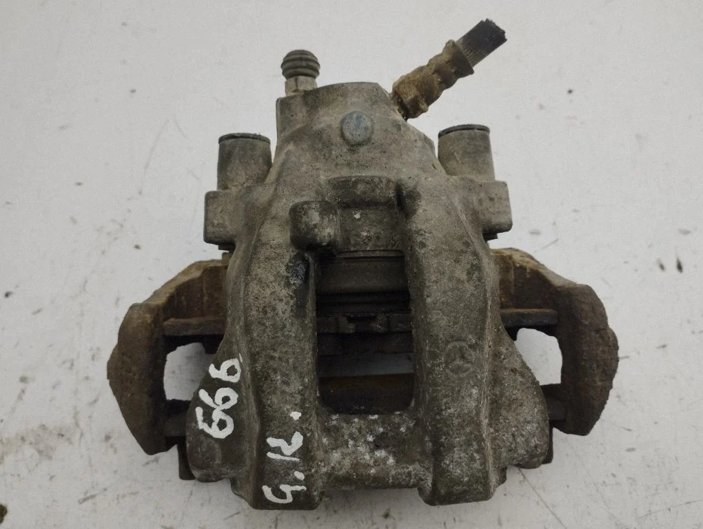 Rear brake caliper – left