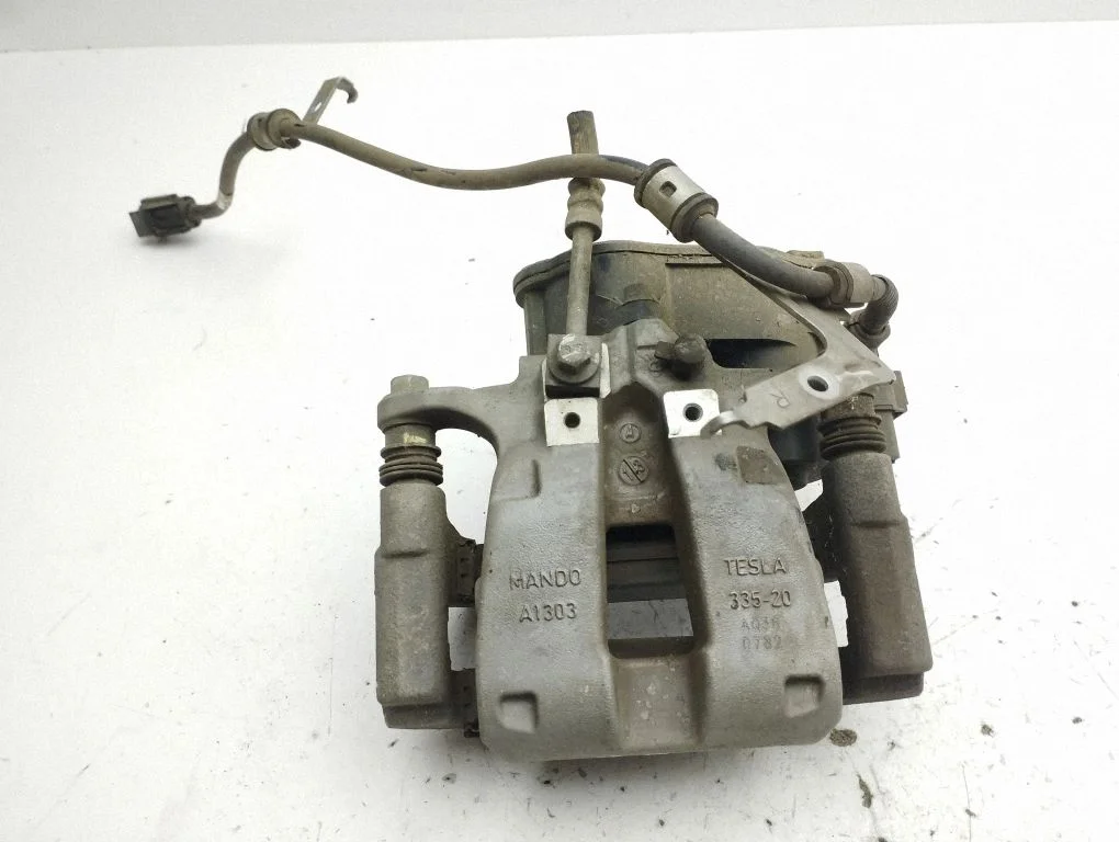 Rear brake caliper – right
