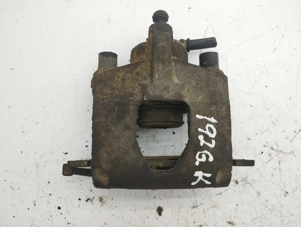 Rear brake caliper – left