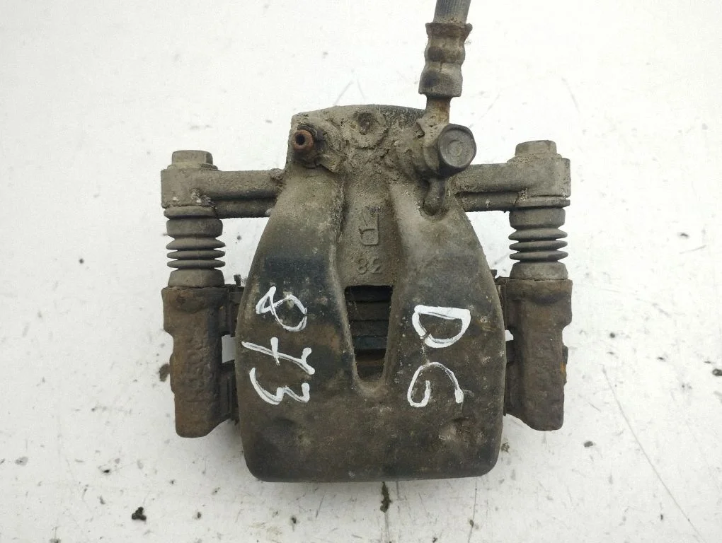 Rear brake caliper – right