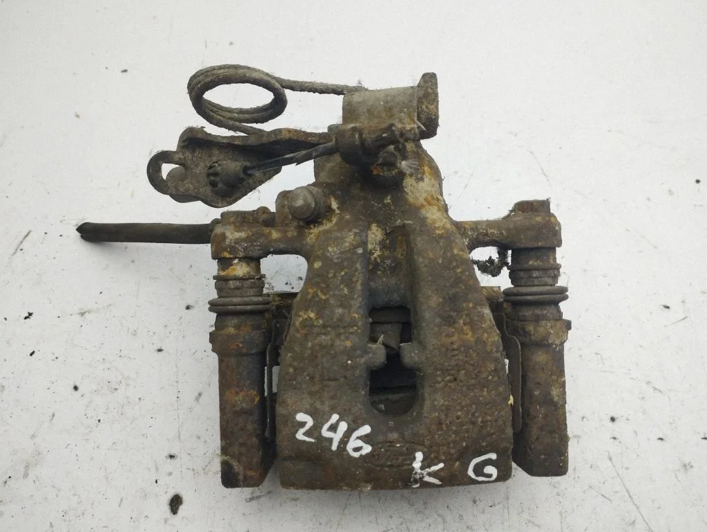 Rear brake caliper – left