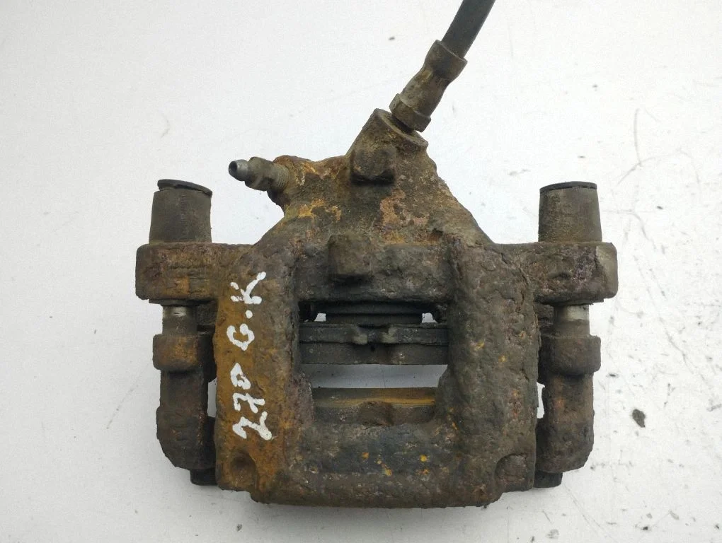 Rear brake caliper – left