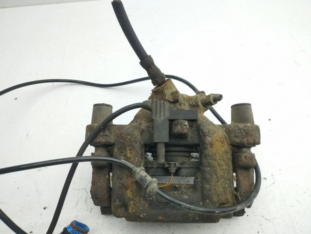 Rear brake caliper – right
